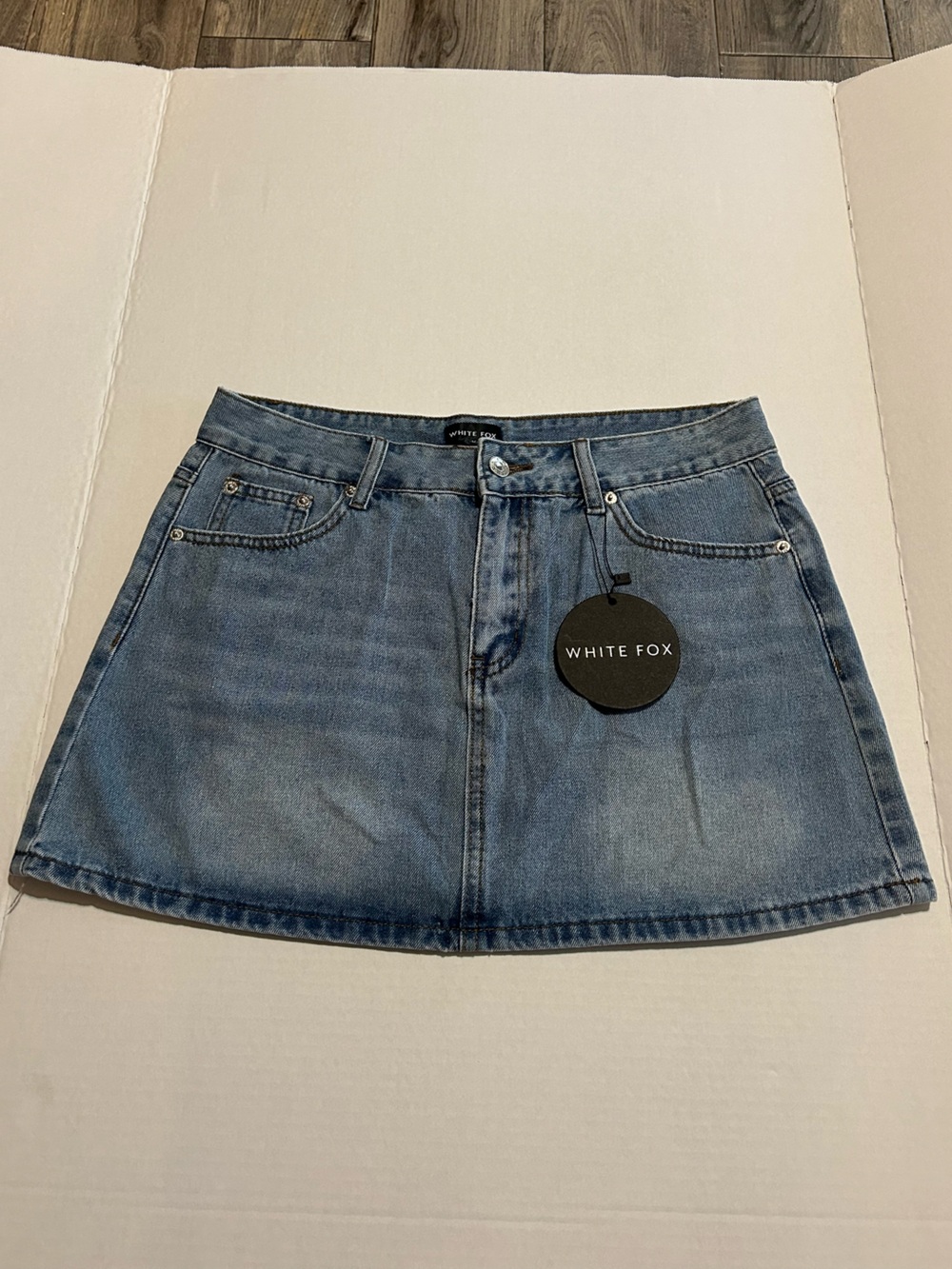 White Fox Boutique Light Blue Denim Mini Skirt. Perfect for summer
